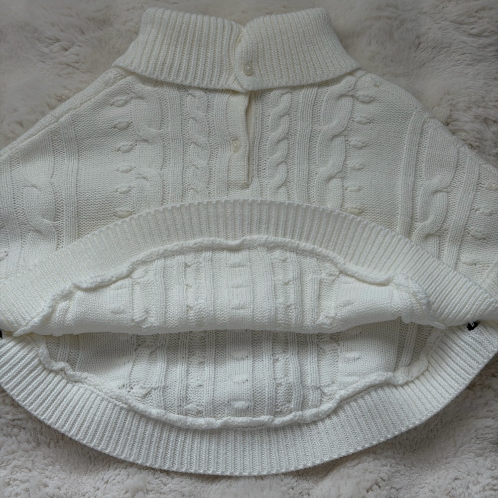 Janie and Jack Ivory Cable-Knit Turtleneck Poncho Cape with Button Accents - Picture 13 of 16